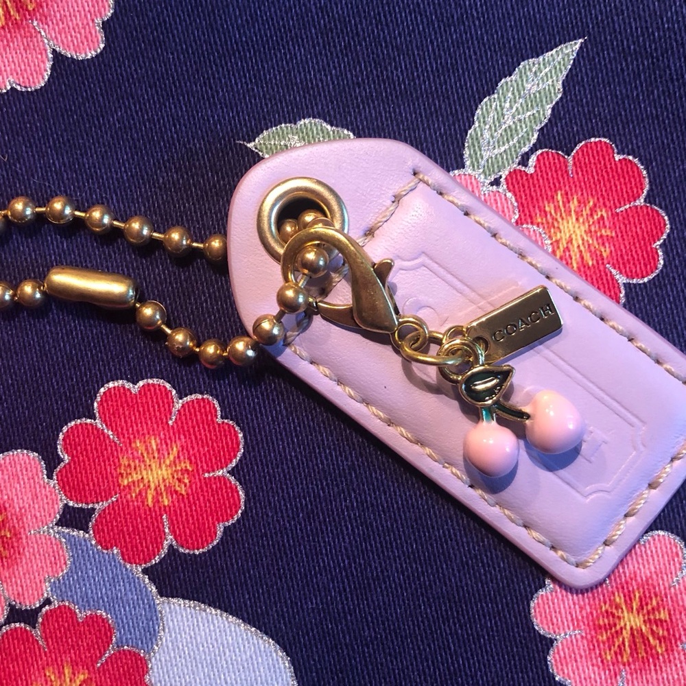 ❌SOLD❌Coach Cherry Bag Charm w/ Large Coach Purple Hangtag
